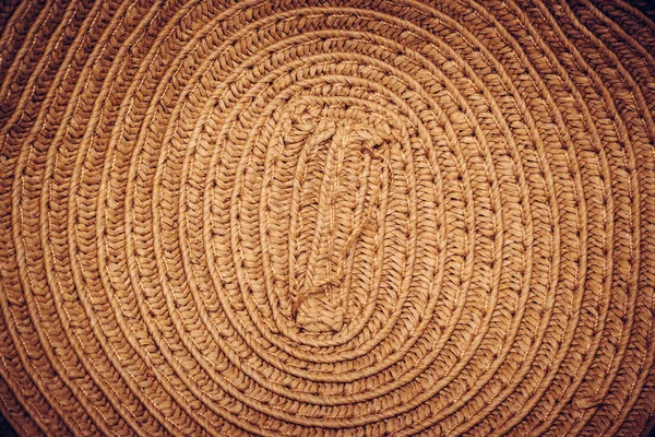 Texture of painted straw hat close up,