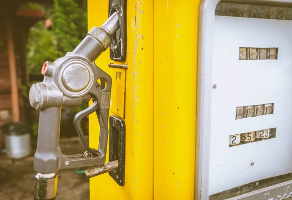 Close up of Yellow vintage fuel dispenser