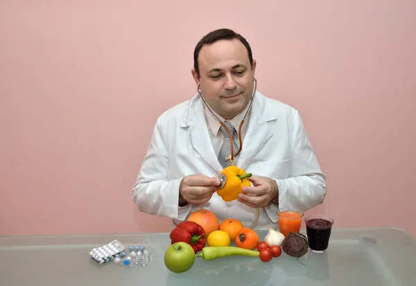 Doctor checking health of a yellow pepper