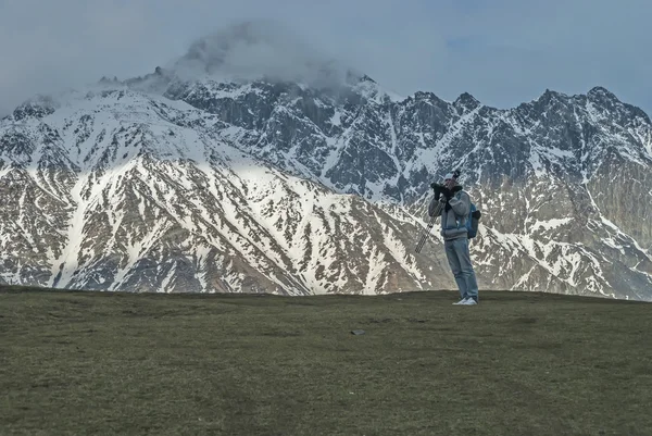 Young man at the foot of mount, Georgia