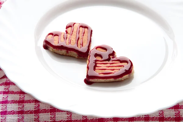 Heart shaped pancakes with jam. Pancake day. Valentine\'s day