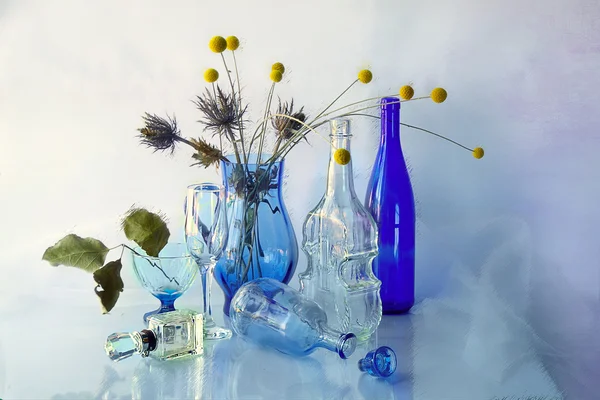 Glass bottle in the still life.