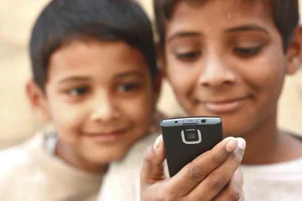 Kids playing on mobile phone