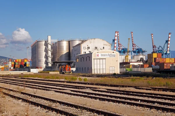 Containers, cranes and silos within the commercial port