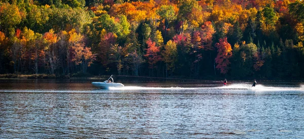 Late summer on a northern Ontario lake - getting in the last session of water skiing.