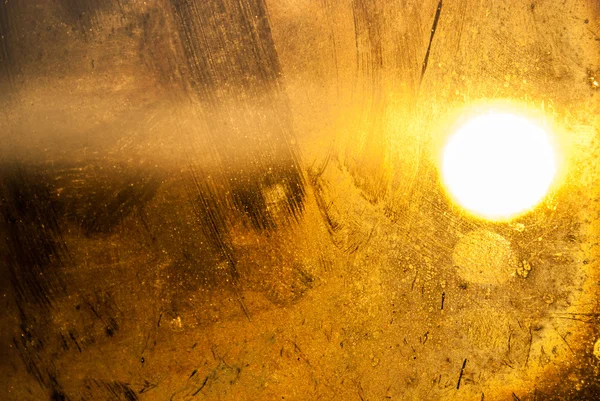 Generic Background abstract of sunlight through dirty glass window.