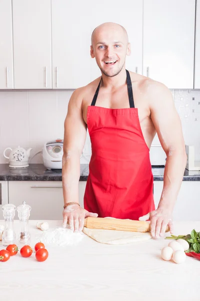 Muscle man cooking