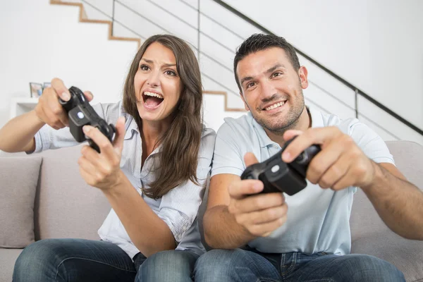 Young couple playing video game