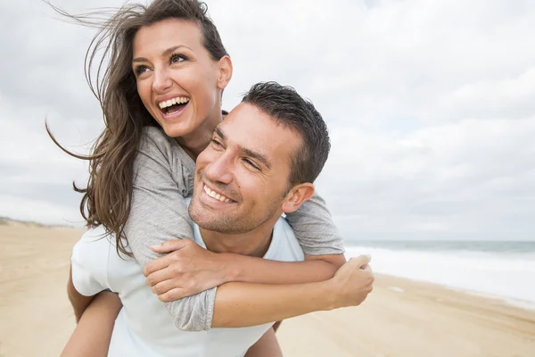 Portrait of living young couple at the beach