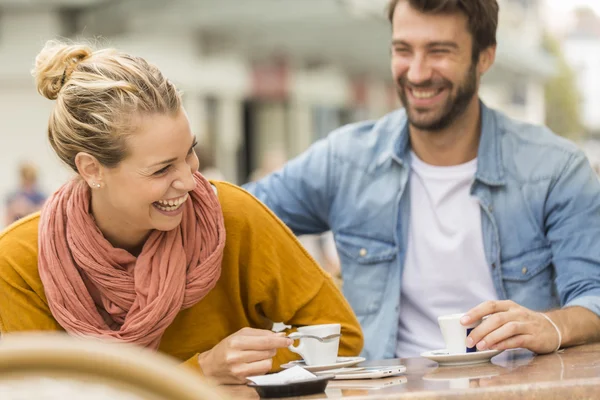 Young couple at a bar terrace