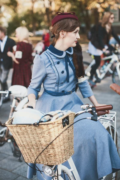 Woman participating in bicycle Retro cruise