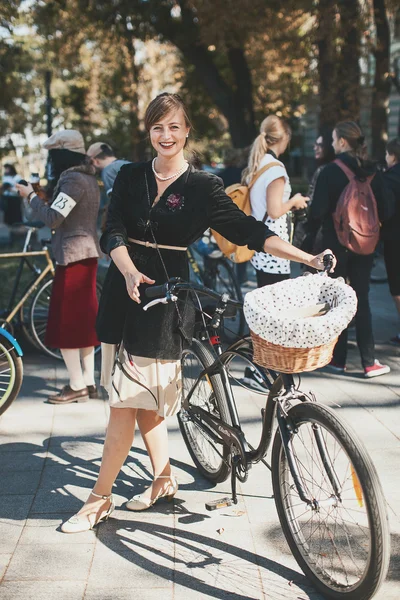 Woman participating in bicycle Retro cruise