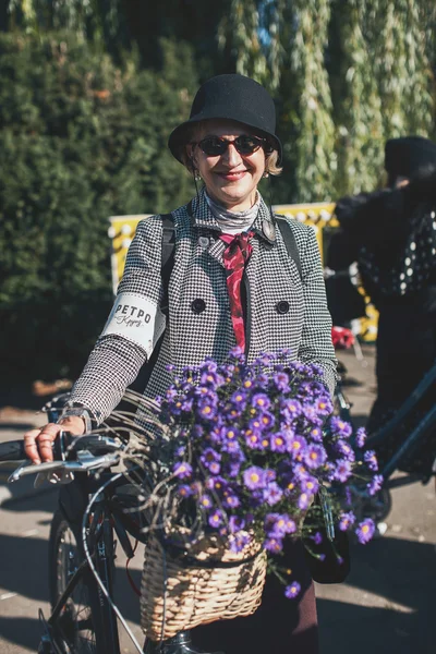 Woman participating in bicycle Retro cruise