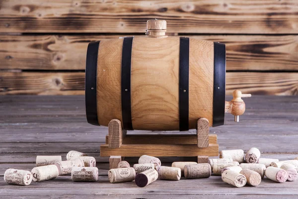 Wooden barrel on a wooden background