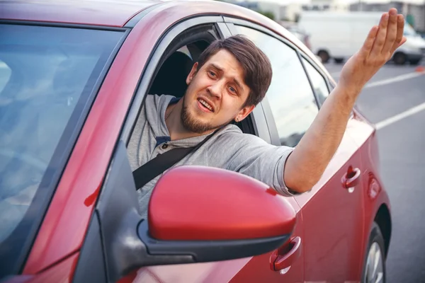 A young man in a road jam