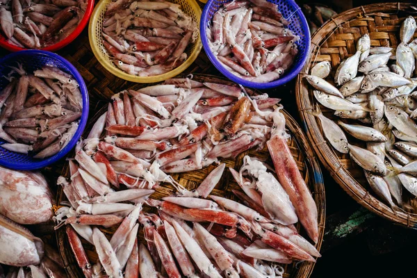 Raw squids at asian street market