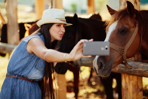 Selfie photo with horse