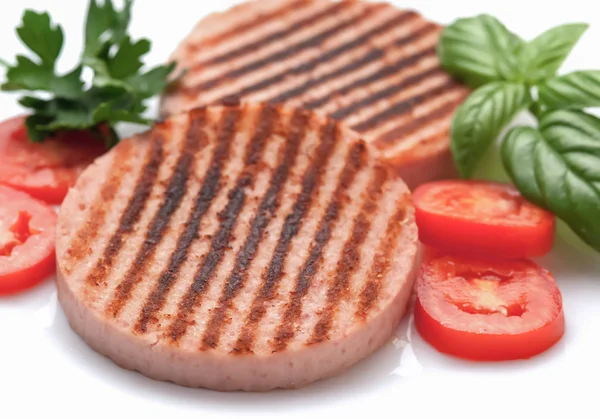 Ham burgers with tomatoes
