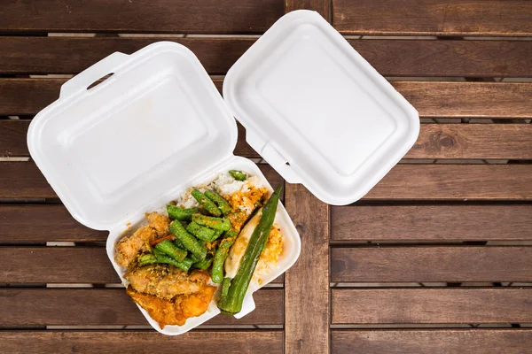 Convenient but unhealthy polystyrene lunch boxes with take away meals