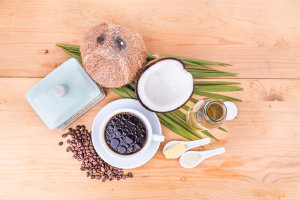 Bulletproof coffee with virgin coconut oil and organic butter