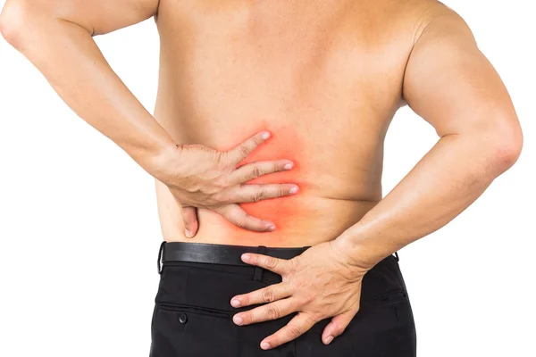 Man suffering from lower back pain embracing his back with hand