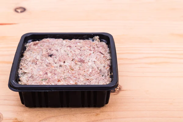 Convenient nutritious packaged minced raw meat dog food in tub