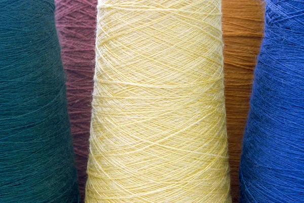 Yellow and green background from threads and yarns