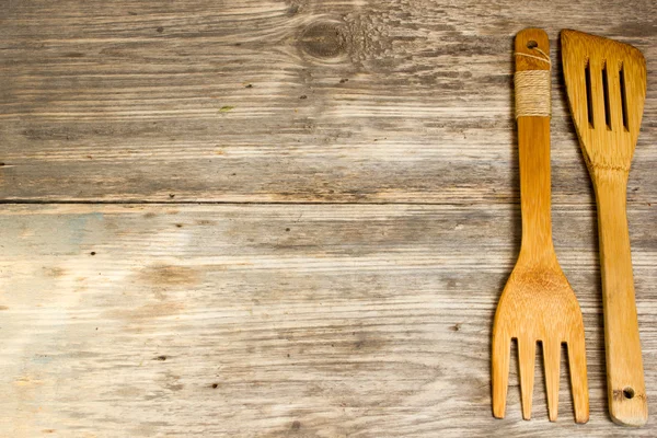 Wooden cutlery. Copy space to right.