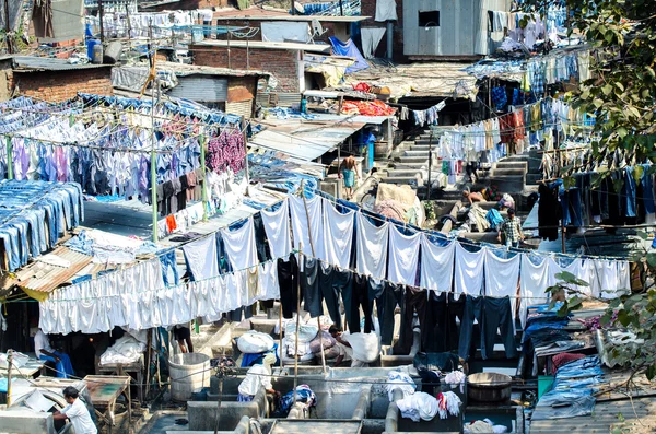 Drying clothes on a clothesline in the street laundry
