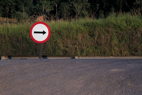 Sign indicating the direction of traffic