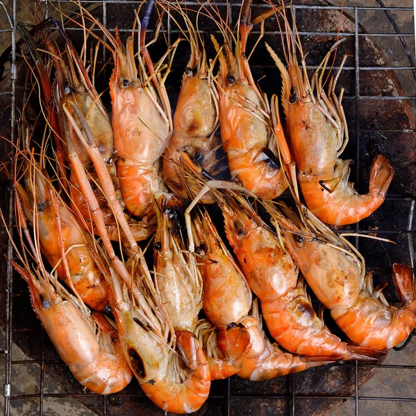 Close up Grilled shrimp with flames