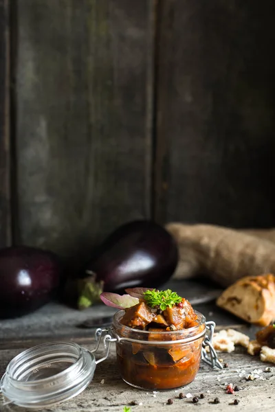 Eggplant caviar with ciabatta, punch, pepper and basil Eggplant dip