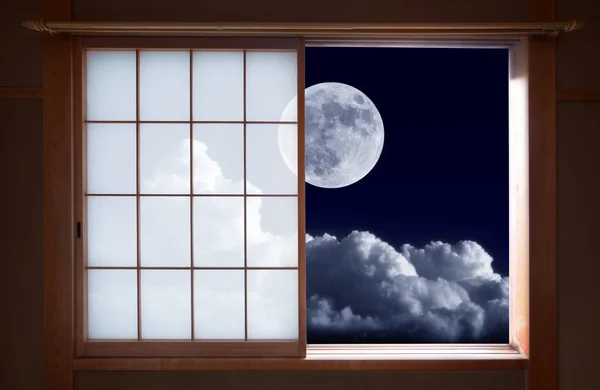 Japanese rice paper sliding window and bright full moon