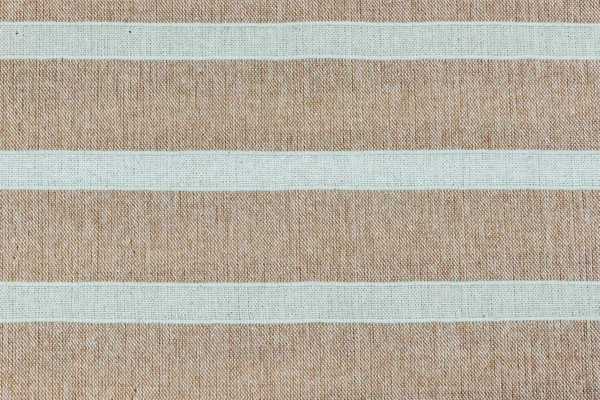 Brown and white cloth as background texture