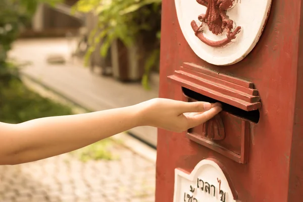 Hand give mail