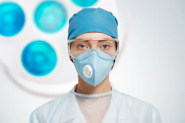 Closeup portrait of female a medical professional surgeon.