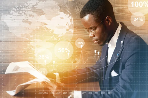 Worldwide connection interface. Double exposure of serious successful African American financier in formal suit reading a financial newspaper, sitting against wooden wall background. Visual effects