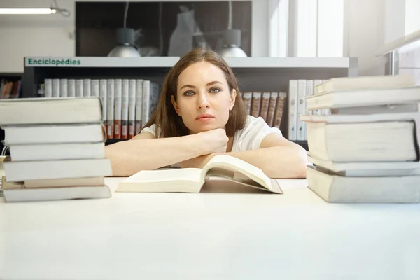 Female student studying at library