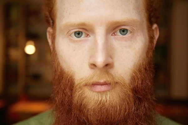 Hipster with long red beard