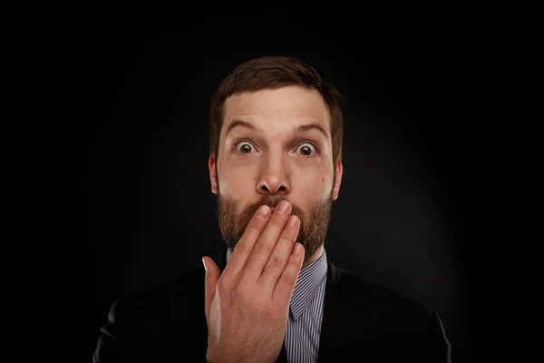 Closeup portrait of businessman in a suit, looking shocked, surprised in full disbelief isolated grey background. Positive human emotions, facial expressions, feeling, attitude, reaction.