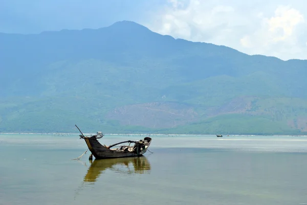 The boat on the water before the storm