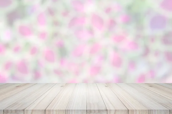 Empty top view of wooden table or counter on colorful bokeh back