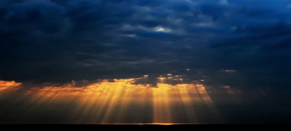 Sun rays through the clouds