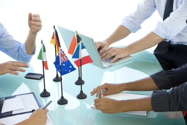 International Meeting with flags on table