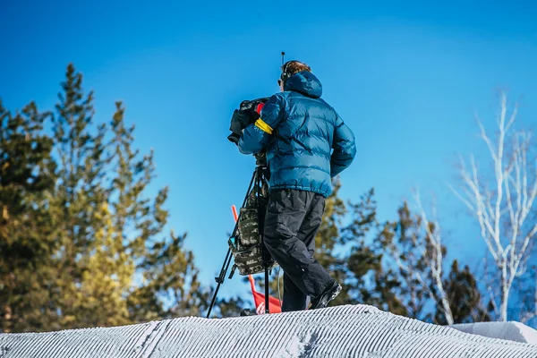 Videographer is broadcast snowboard competition