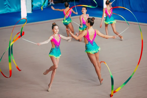 Group performance gymnasts exercises with ribbons