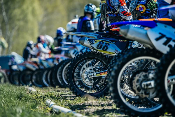 Racer motorbike ready to start a rear view of wheel