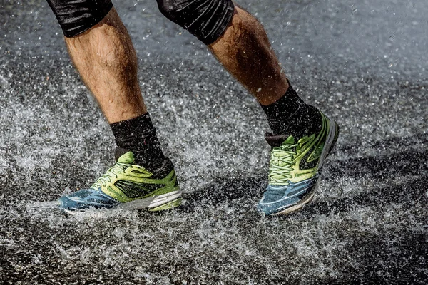 Athlete foot men in knee pads running