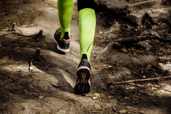 Girl runs a marathon stone trail