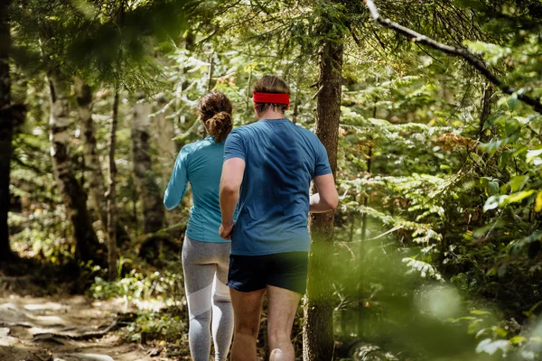 Runners woman and man run